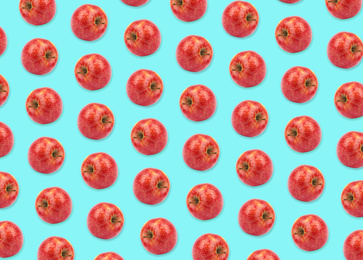 Image of Pattern of red apples on light blue background