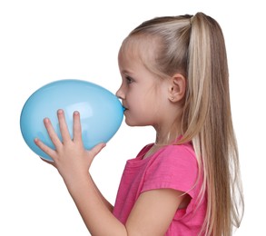 Photo of Cute little girl inflating light blue balloon on white background