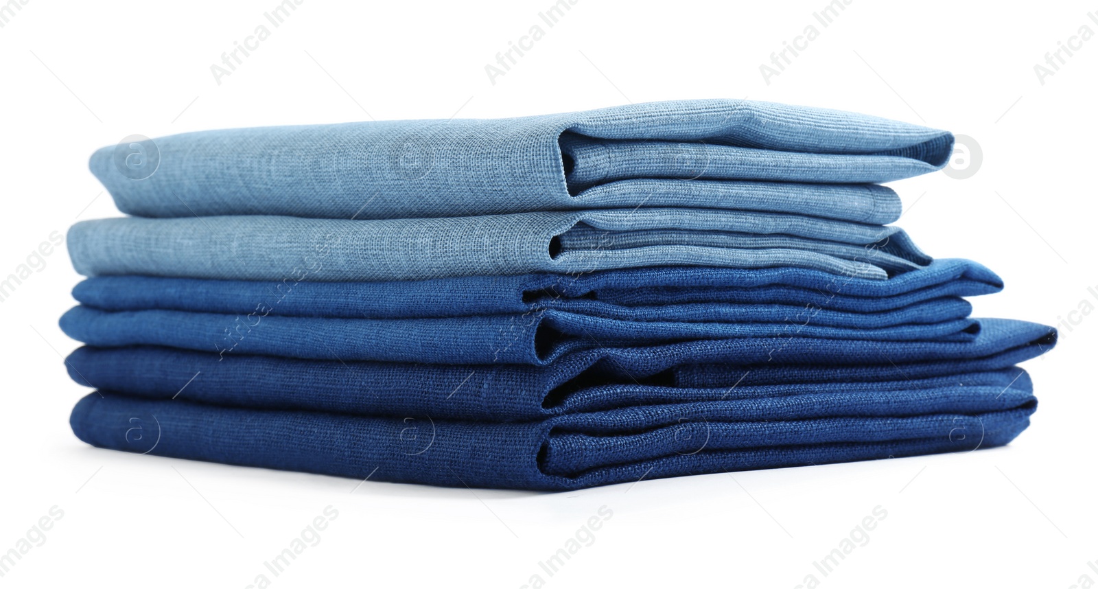 Photo of Stack of fabric napkins for table setting isolated on white