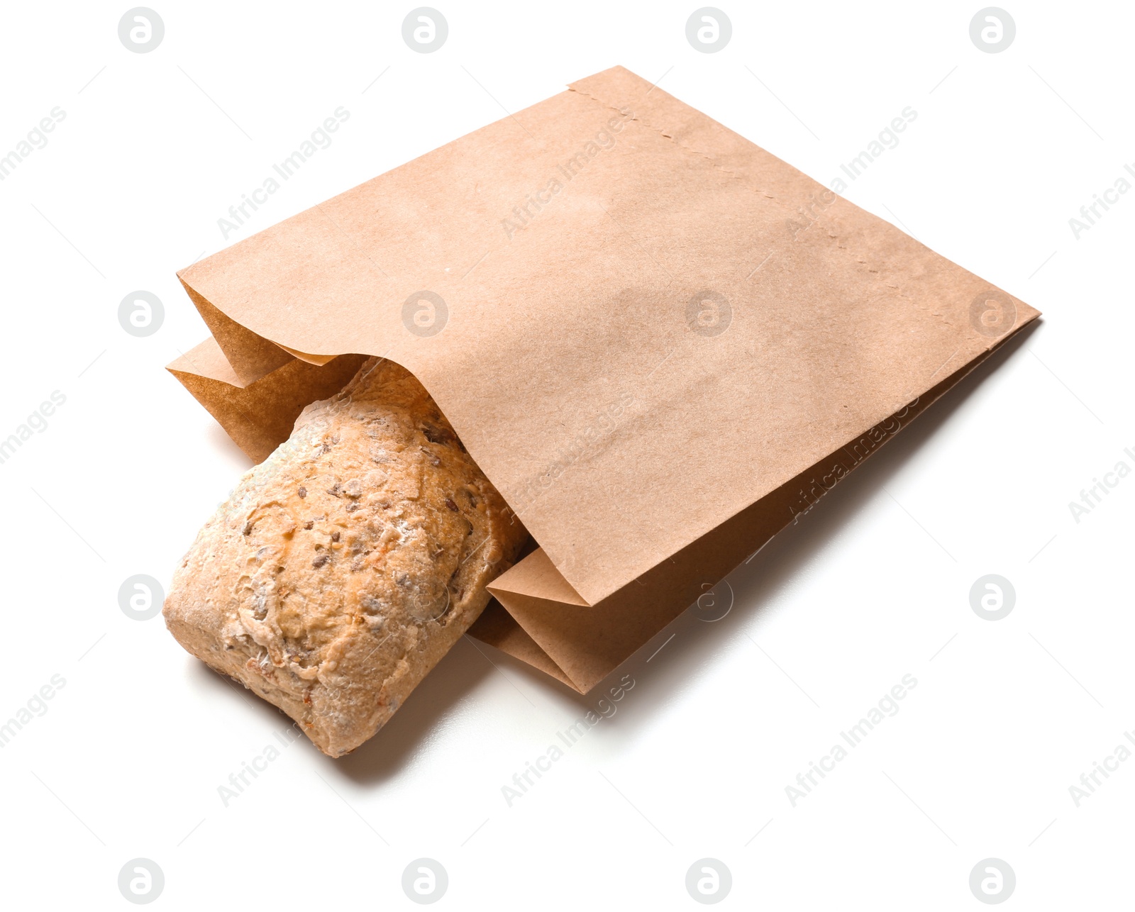 Photo of Paper bag with bread on white background. Space for design