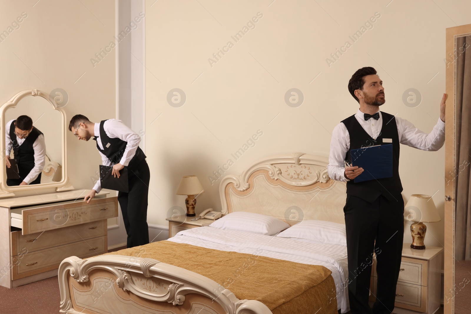 Photo of Men attending professional butler courses in hotel