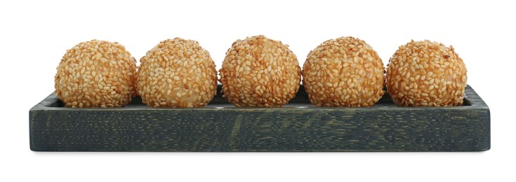 Photo of Many delicious sesame balls on white background