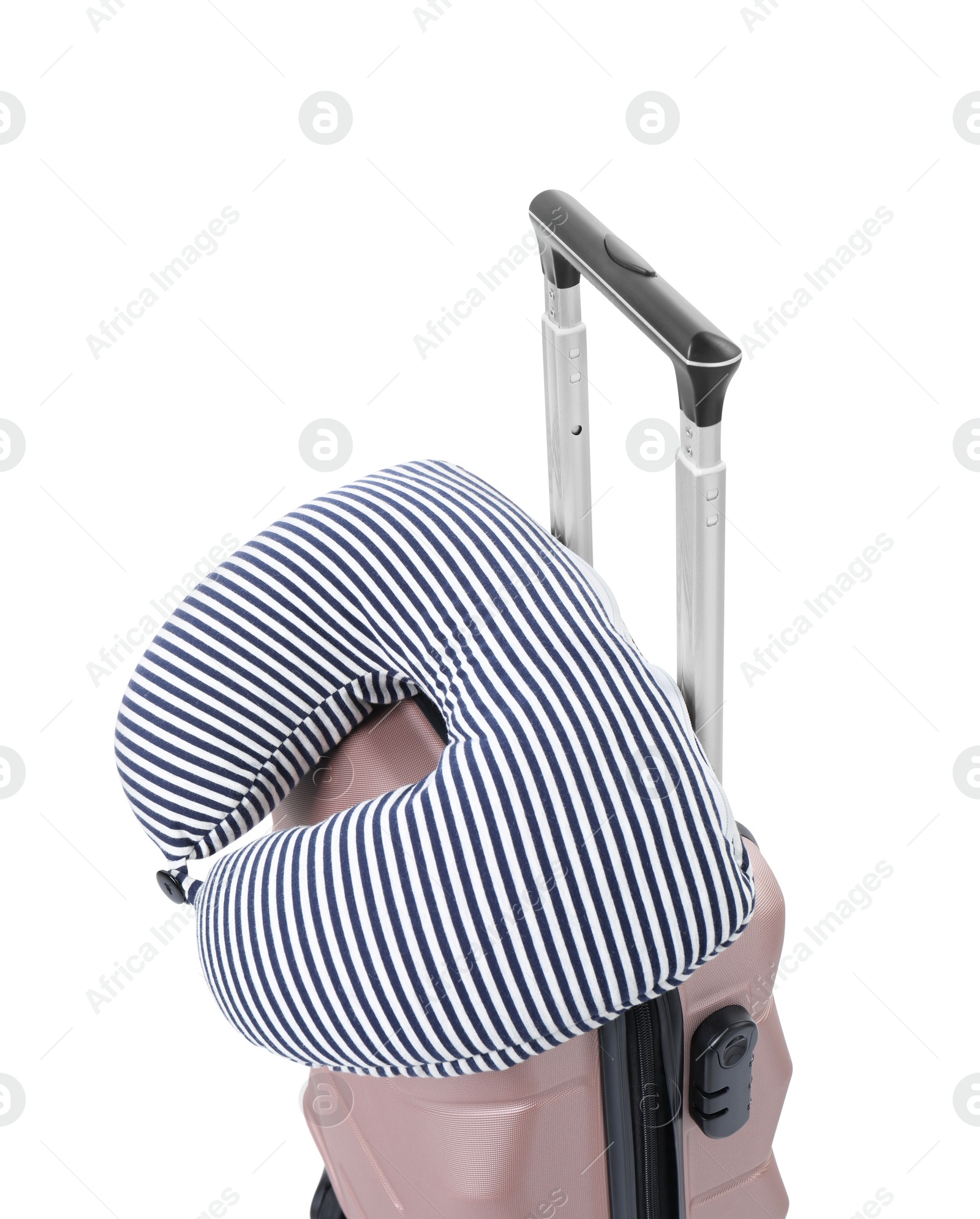 Photo of Soft travel pillow on suitcase isolated on white