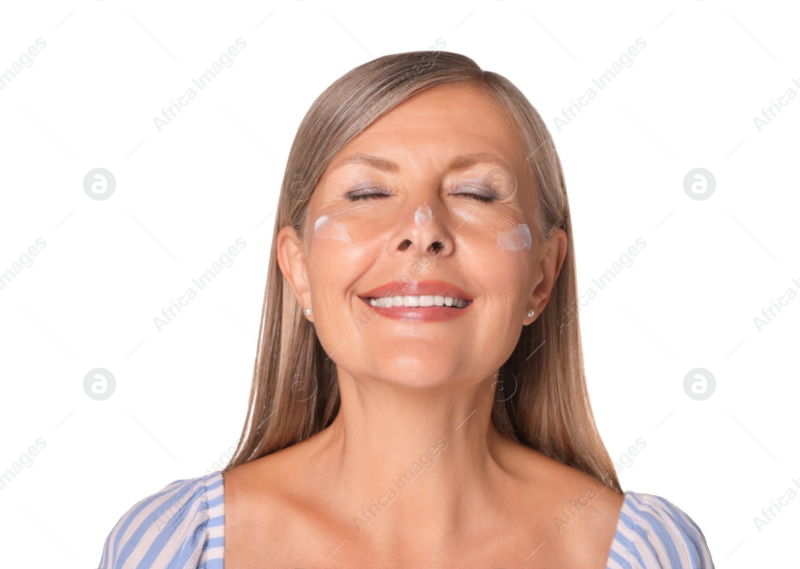 Photo of Beautiful senior woman with sun protection cream on her face isolated on white