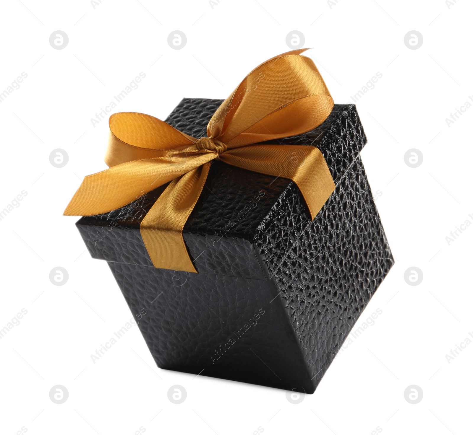 Photo of Beautiful black gift box with golden bow on white background