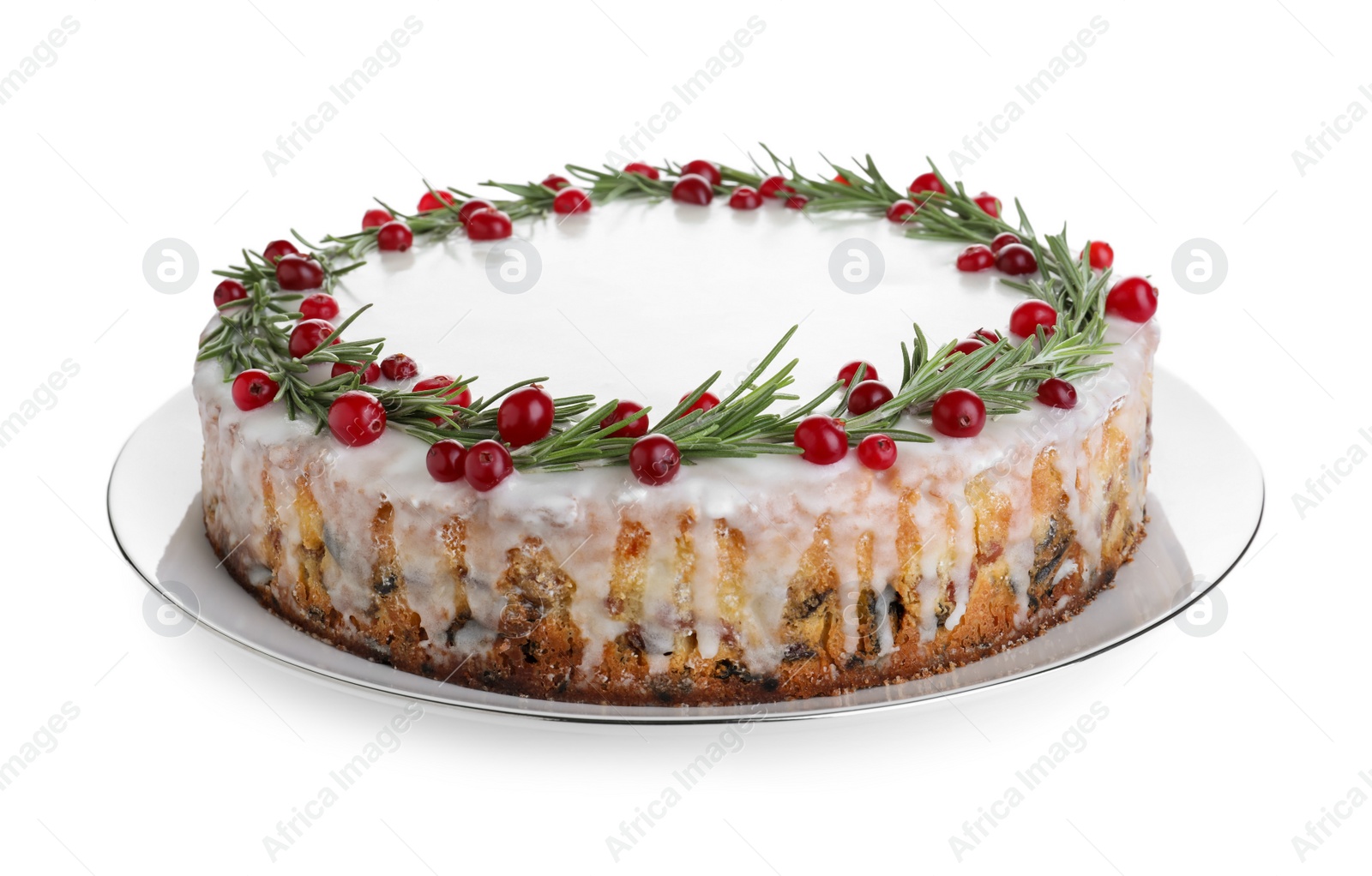 Photo of Traditional Christmas cake decorated with rosemary and cranberries isolated on white