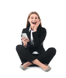 Photo of Emotional businesswoman in office wear with smartphone celebrating victory on white background