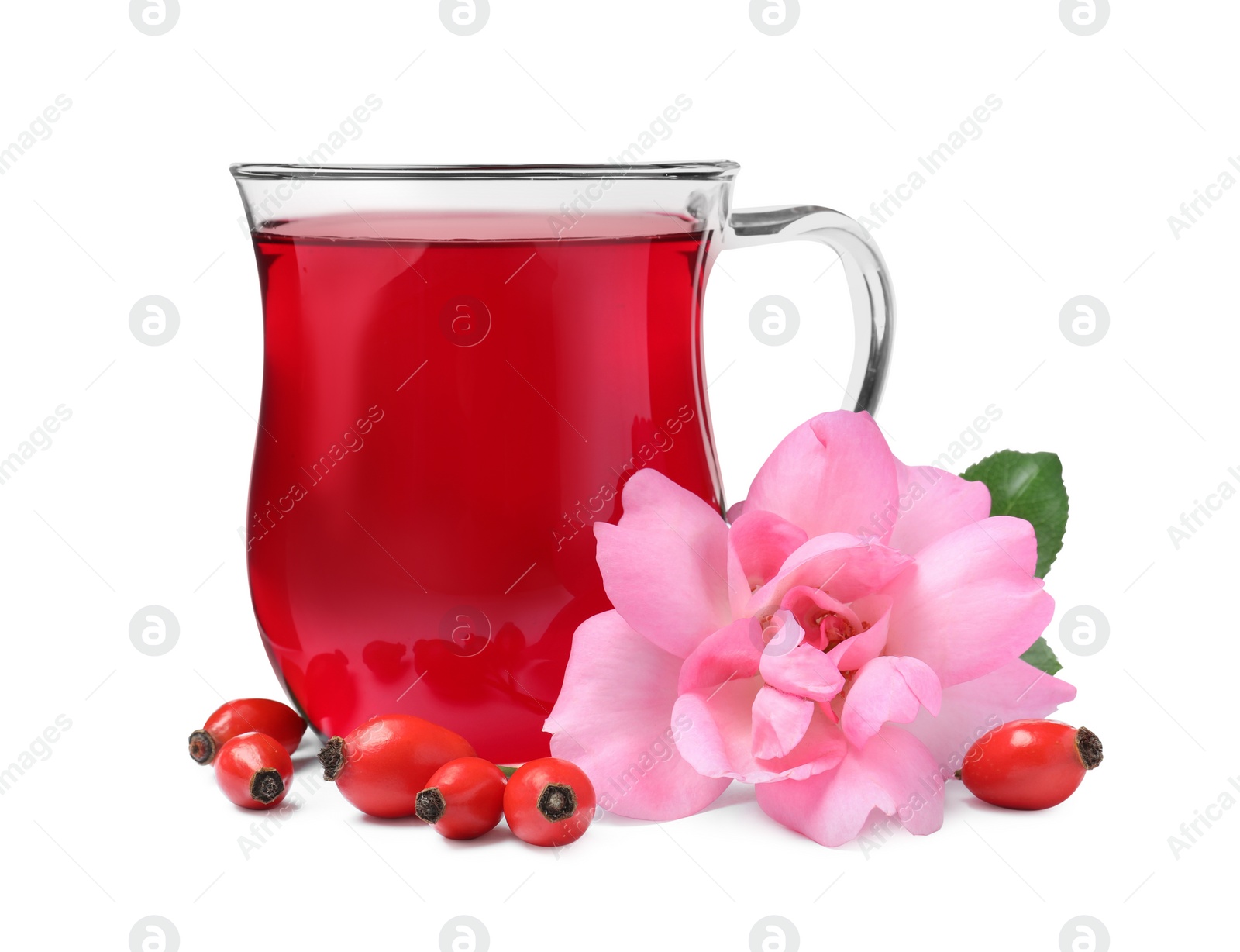 Photo of Aromatic rose hip tea, flower and fresh berries on white background