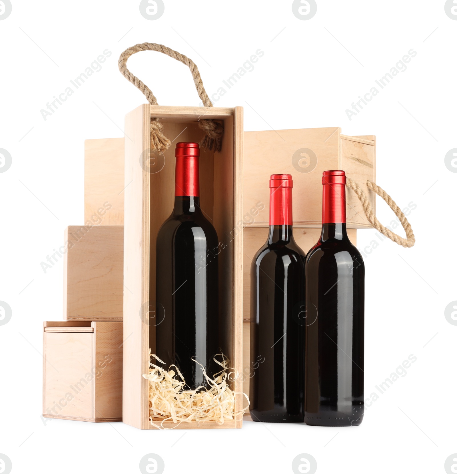 Photo of Wooden gift boxes with wine isolated on white