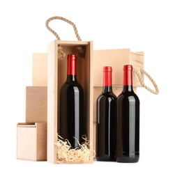 Wooden gift boxes with wine isolated on white