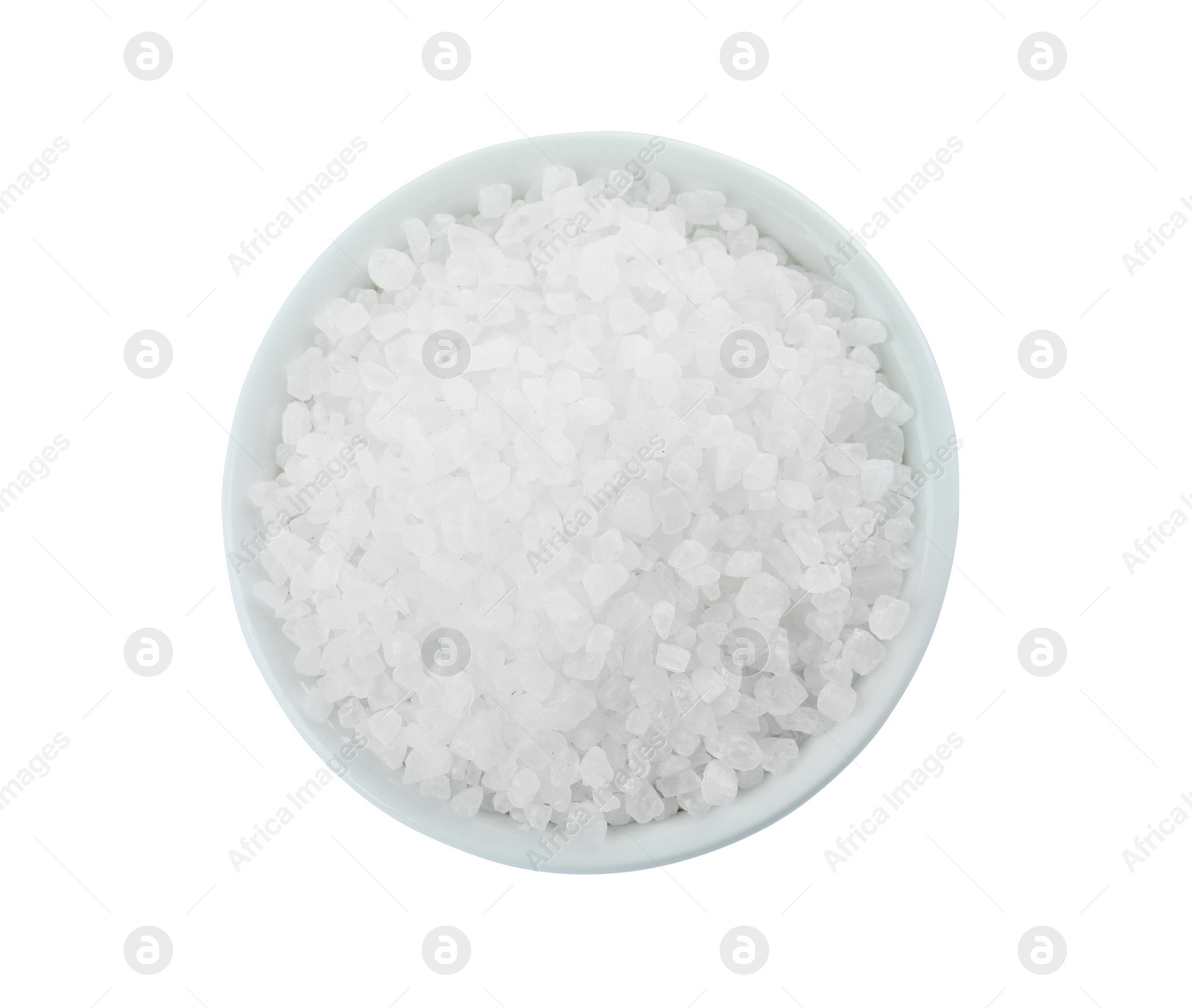 Photo of Natural sea salt in bowl isolated on white, top view