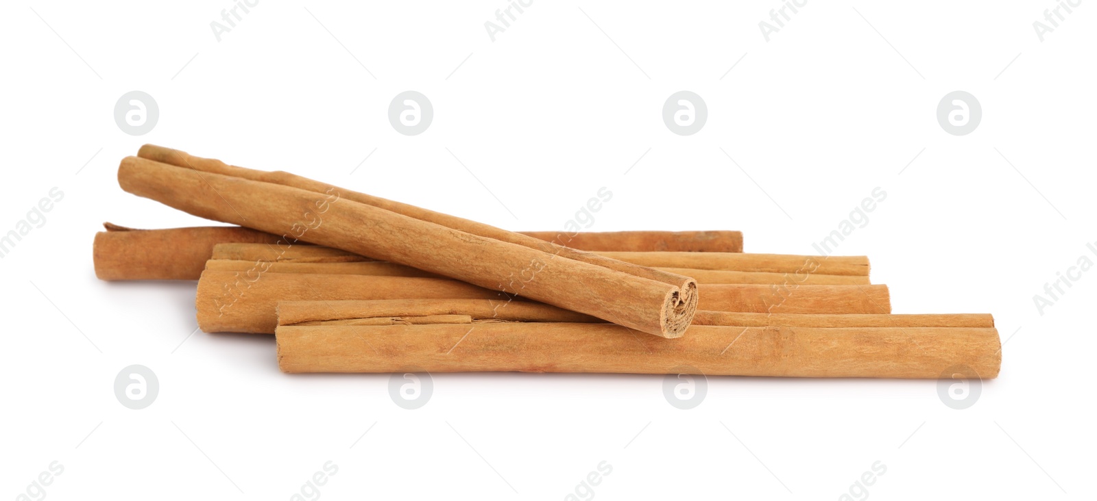 Photo of Aromatic dry cinnamon sticks on white background