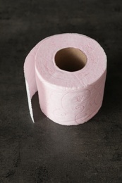 Soft toilet paper roll on black background