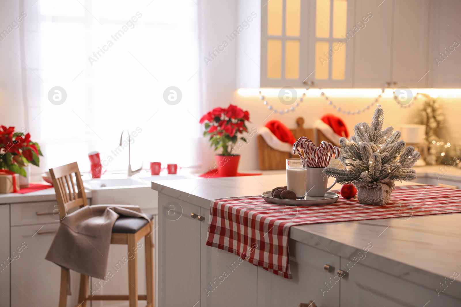 Photo of Beautiful kitchen interior with stylish Christmas decor