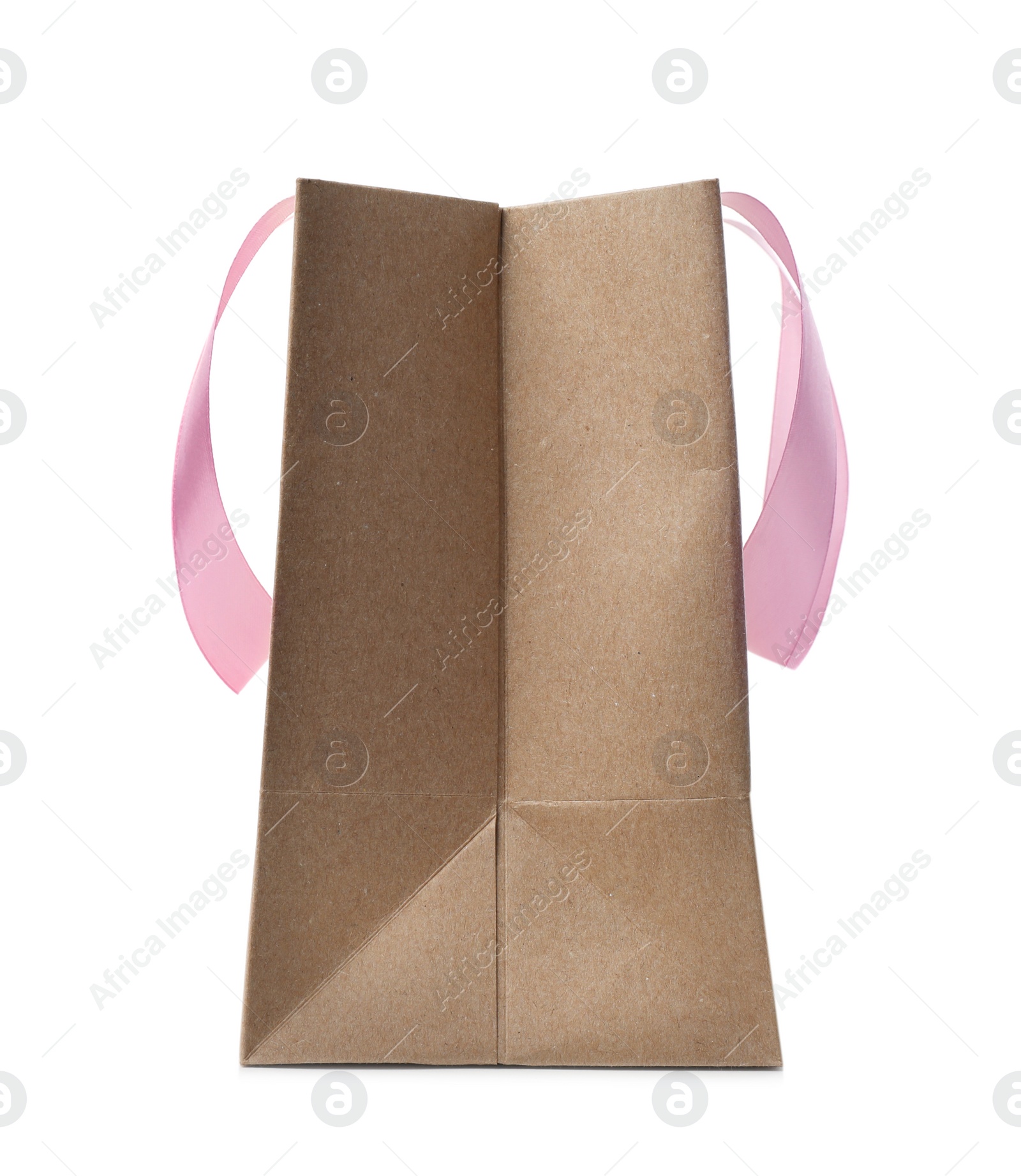 Photo of Paper shopping bag with ribbon handles on white background