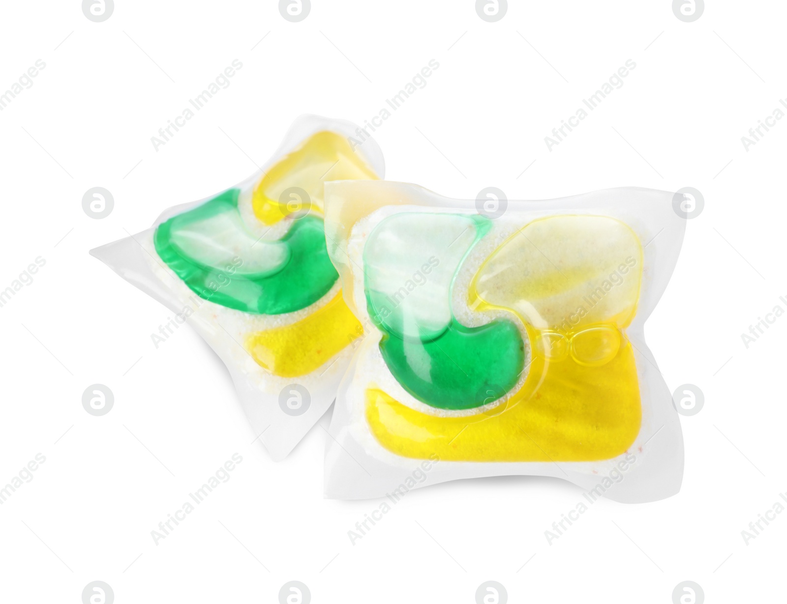 Photo of Two dishwasher detergent pods on white background