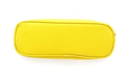 Photo of Yellow pen case on white background. Stationery for school