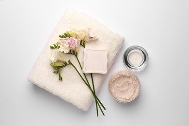 Flat lay composition with different spa products on white background