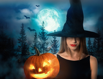 Image of Woman in witch hat with spooky pumpkin head jack lantern and misty forest under full moon on Halloween