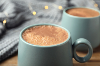 Photo of Cup of delicious hot cocoa, closeup view