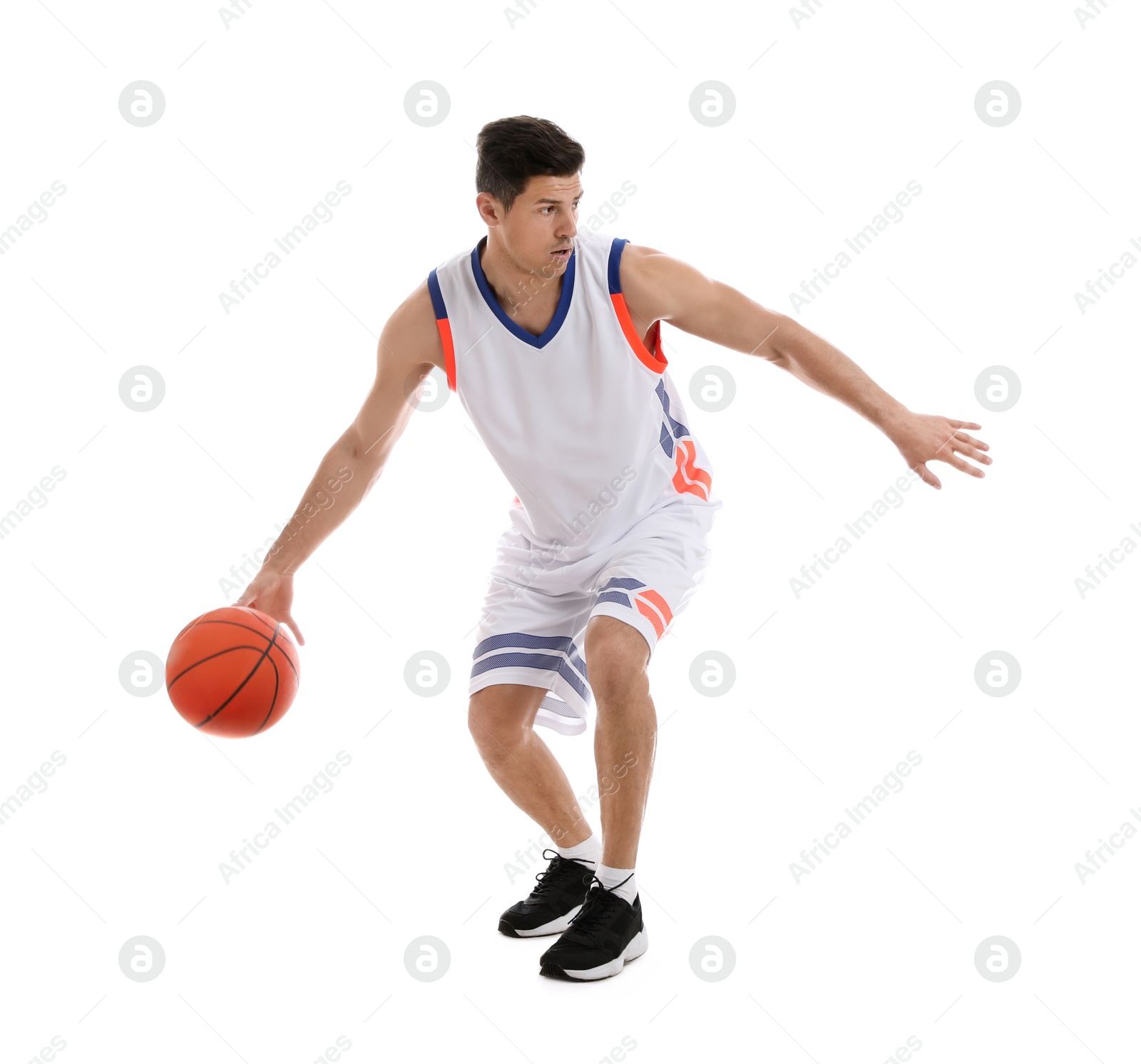 Photo of Professional sportsman playing basketball on white background