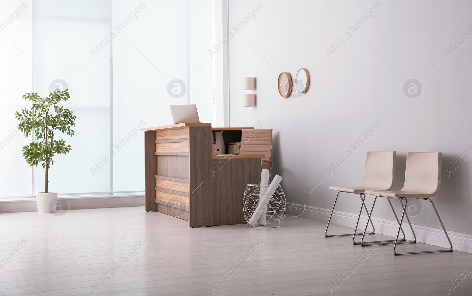 Photo of Hotel lobby interior with wooden reception desk