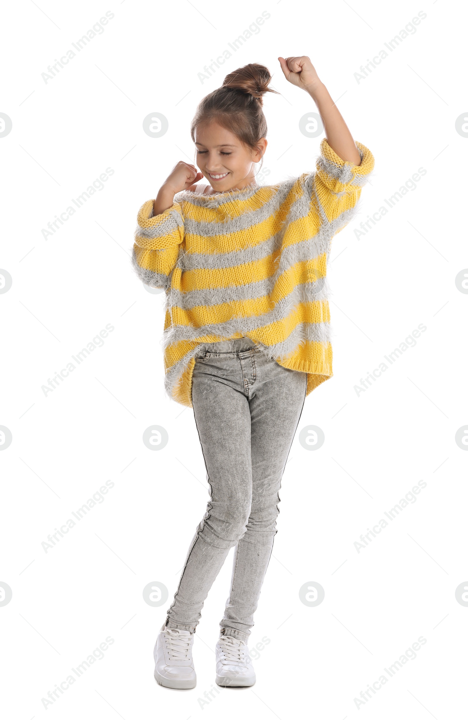 Photo of Full length portrait of emotional preteen girl against white background