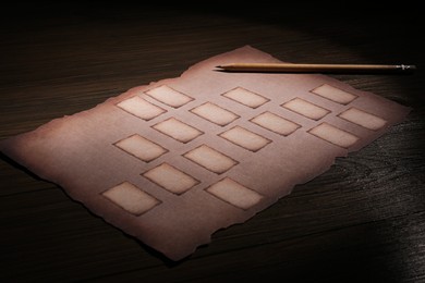 Blank family tree and pencil on wooden table