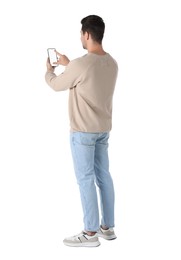 Photo of Man using smartphone with blank screen on white background