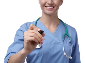 Photo of Doctor with stethoscope and marker on white background, closeup. Cardiology concept
