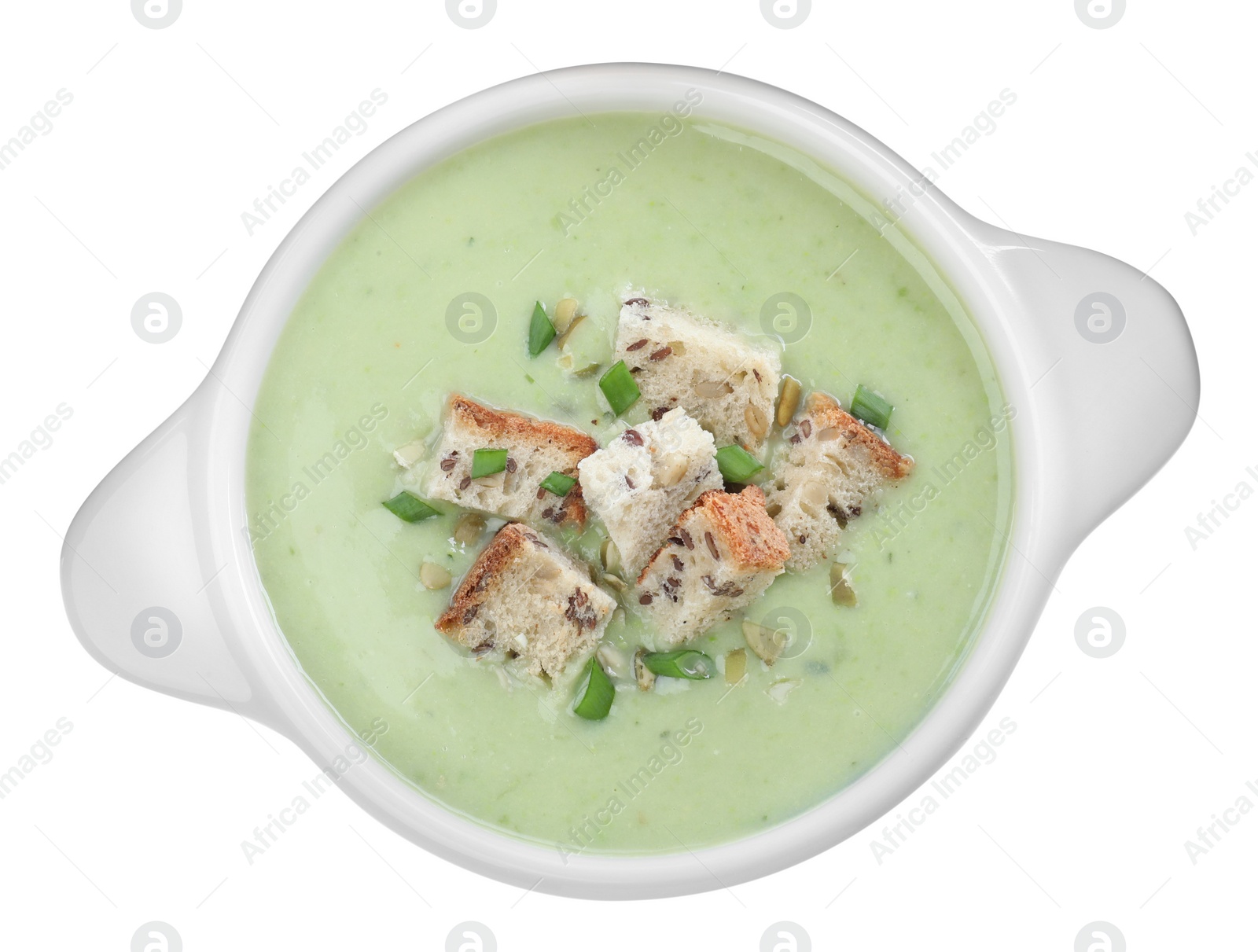 Photo of Delicious asparagus soup with croutons and green onion on white background, top view
