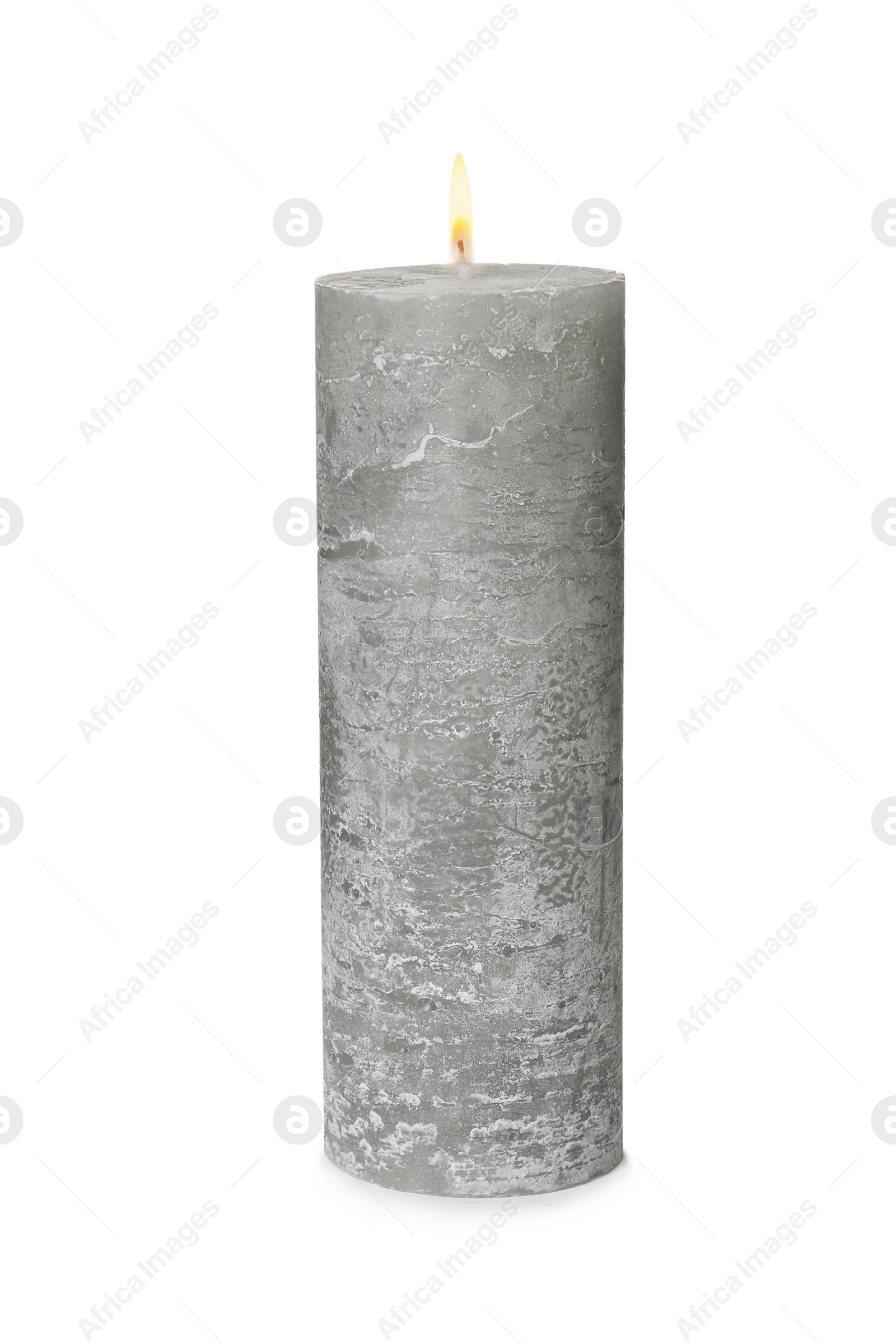 Photo of One alight wax candle on white background