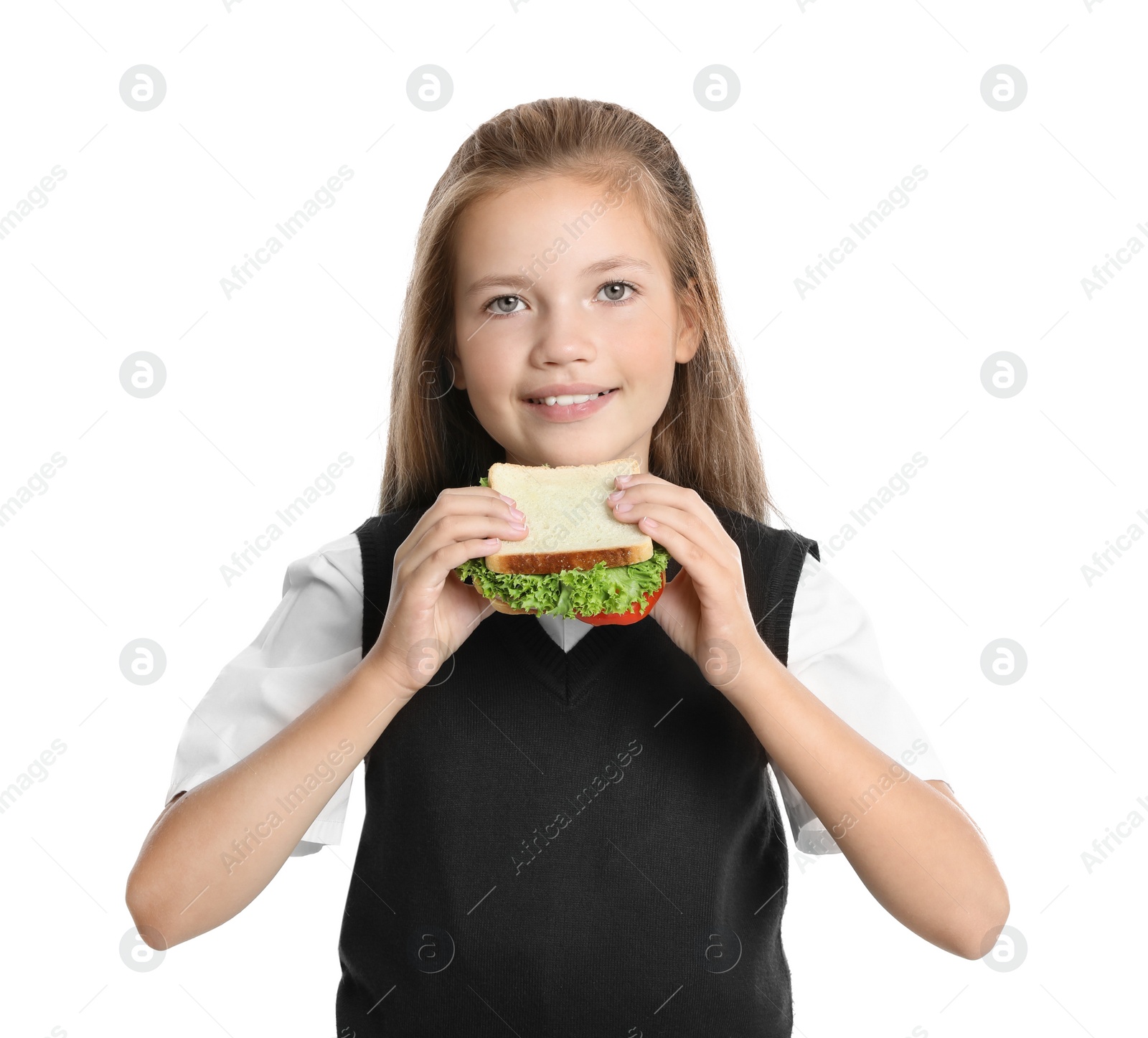 Photo of Happy girl with sandwich on white background. Healthy food for school lunch