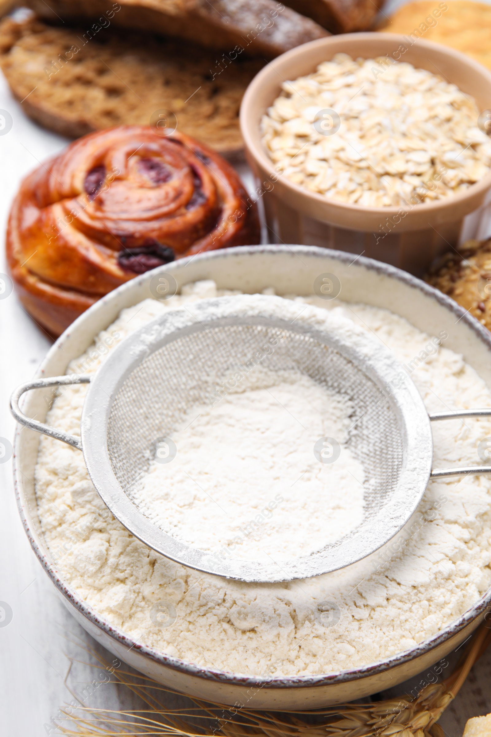 Photo of Different gluten free products on white wooden table