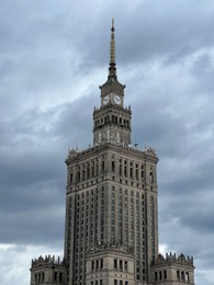 Photo of WARSAW, POLAND - JULY 17, 2022: Beautiful Palace of Culture and Science building against cloudy sky