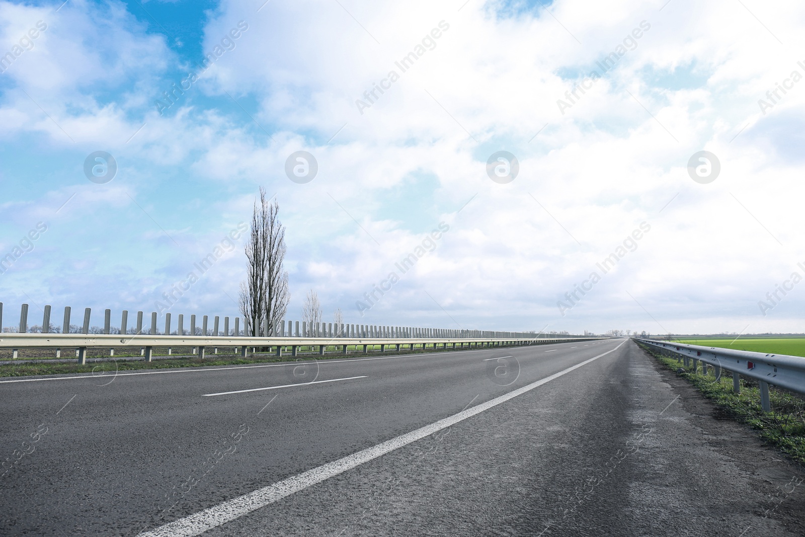 Photo of Beautiful view of asphalt highway without transport