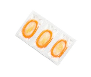 Photo of Condom packages on white background, top view. Safe sex