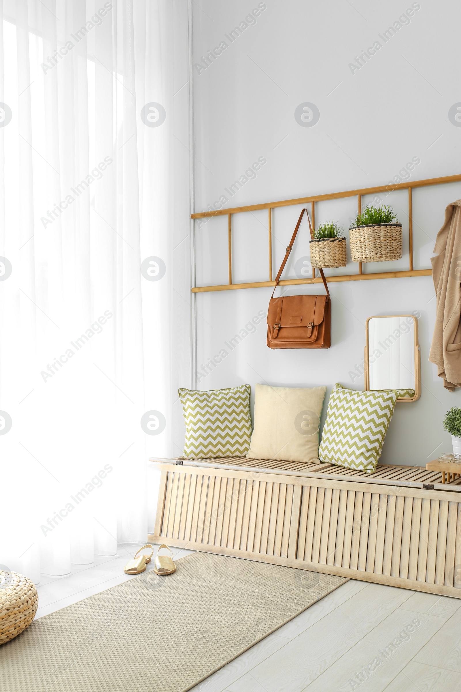 Photo of Cozy hallway interior with new stylish furniture