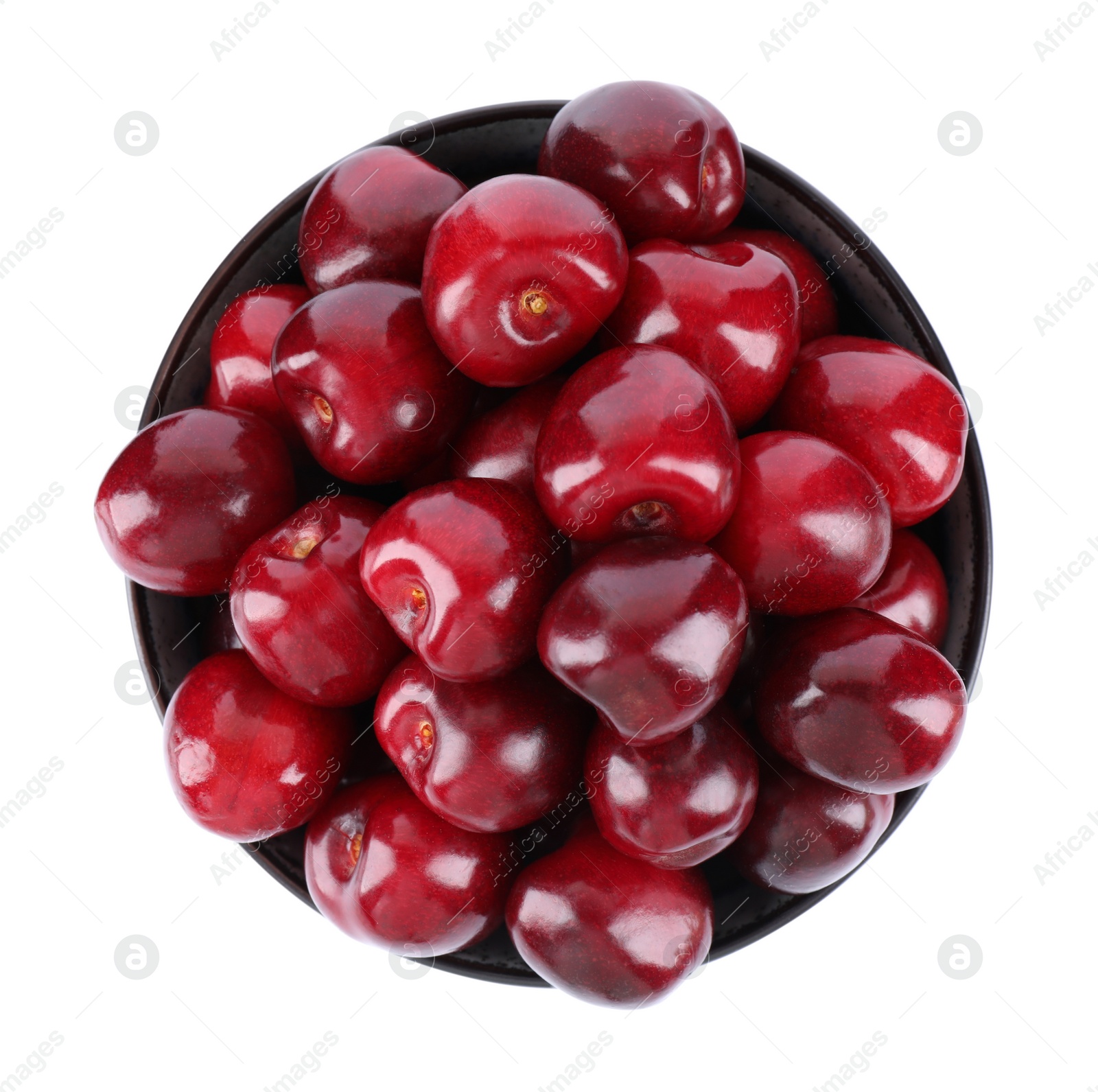 Photo of Tasty ripe red cherries in bowl isolated on white, top view