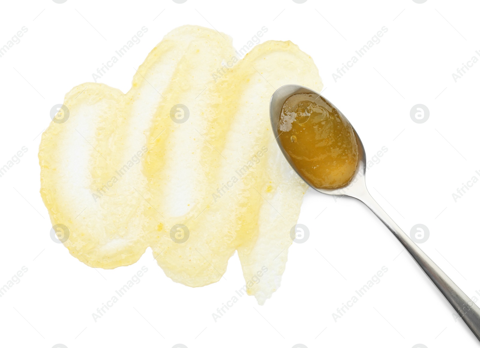 Photo of Tasty sweet jam and spoon isolated on white, top view