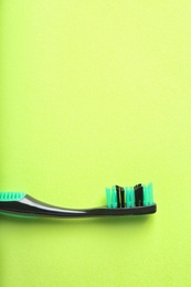 Photo of Manual toothbrush on color background. Dental care