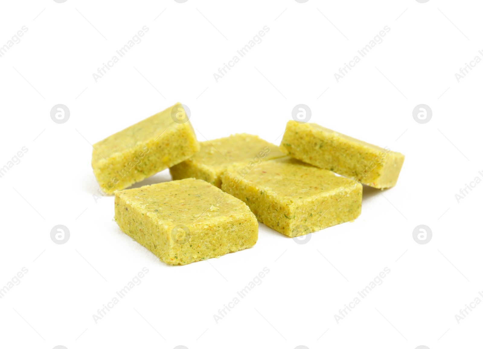 Photo of Bouillon cubes on white background. Broth concentrate