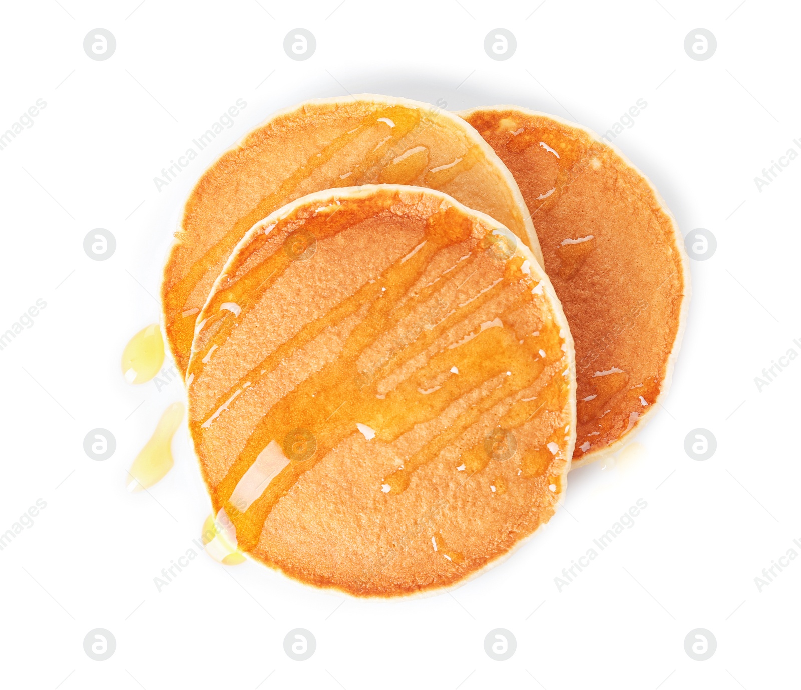 Photo of Tasty pancakes with maple syrup on white background, top view