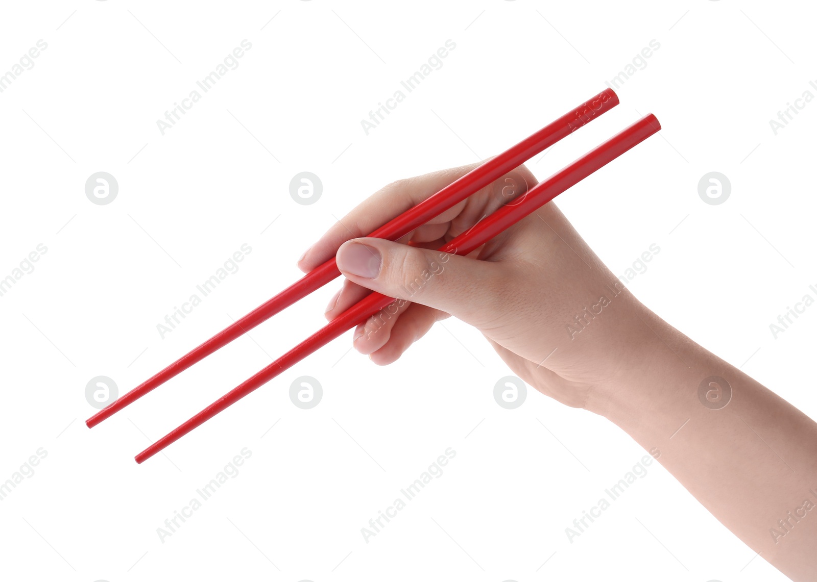 Photo of Woman holding pair of red chopsticks on white background, closeup