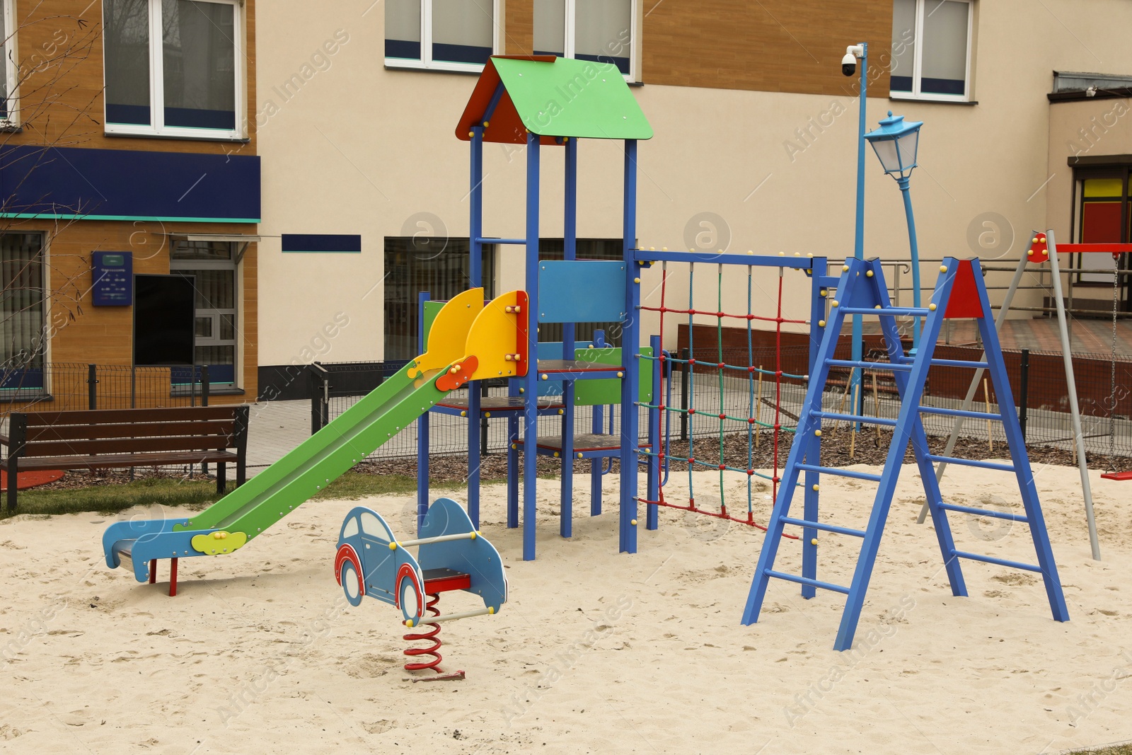 Photo of Empty outdoor children's playground in residential area