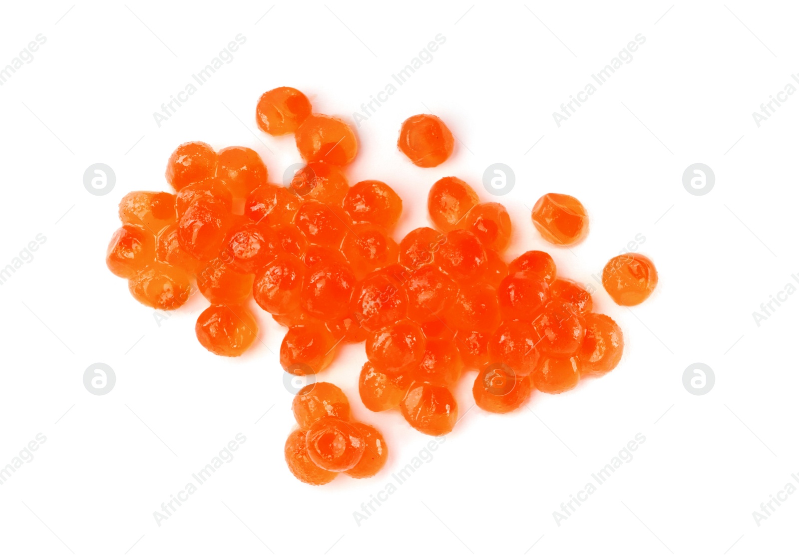 Photo of Pile of delicious red caviar isolated on white, top view