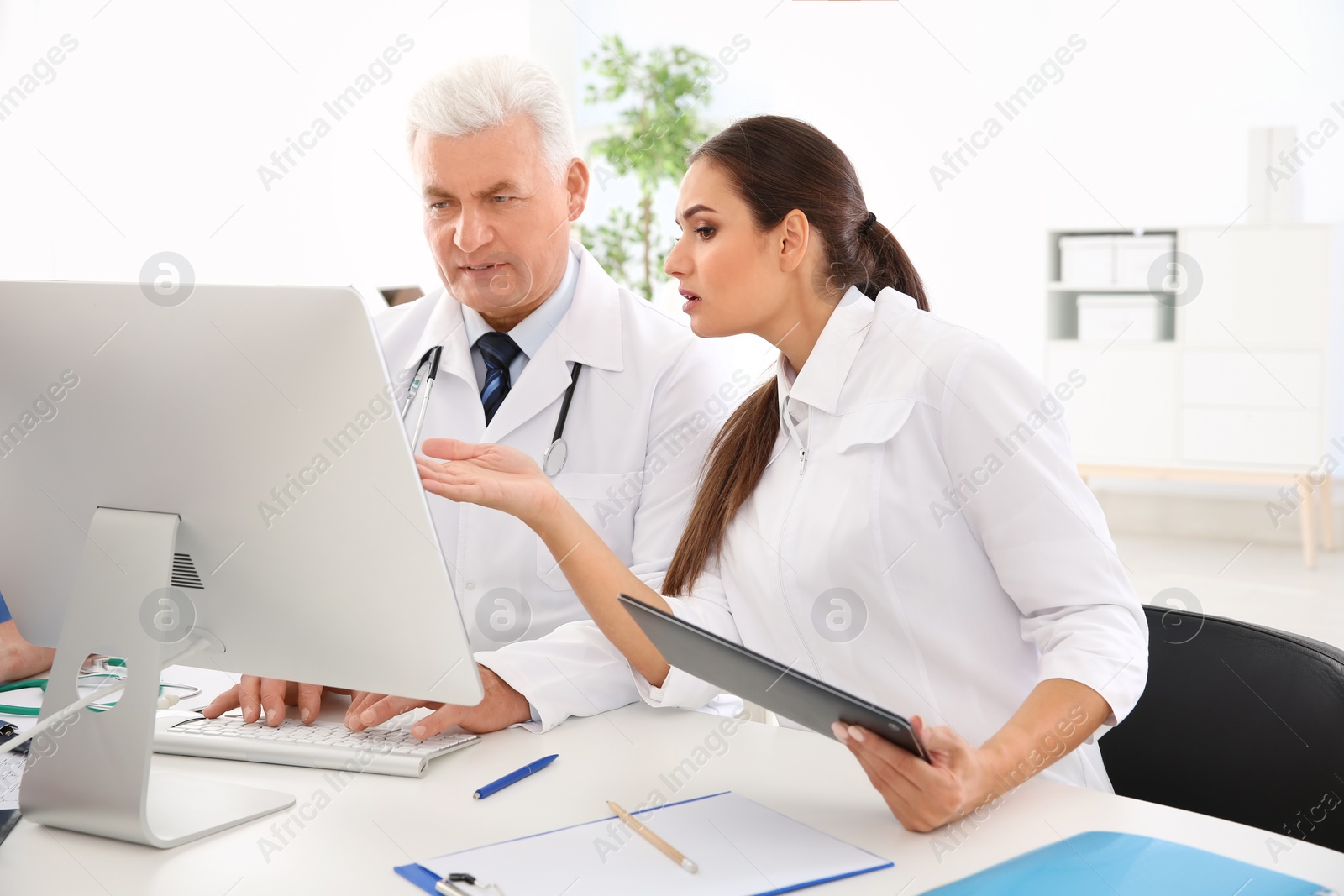 Photo of Doctors attending conference in clinic. Cardiology center