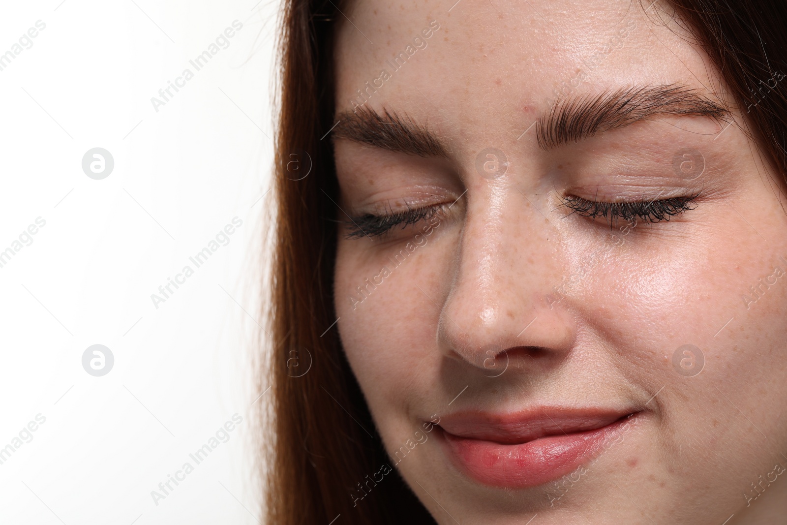 Photo of Portrait of beautiful woman with freckles on white background, closeup