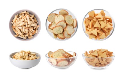 Image of Set with different delicious crispy rusks on white background