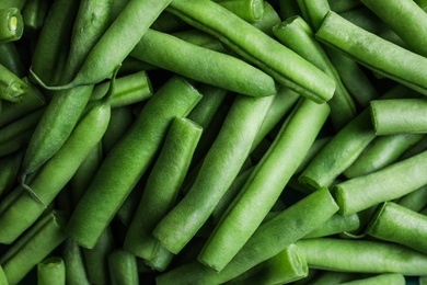 Photo of Fresh green beans as background, top view